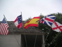 Five of the flags that have been flown over Florida throughout the centuries.